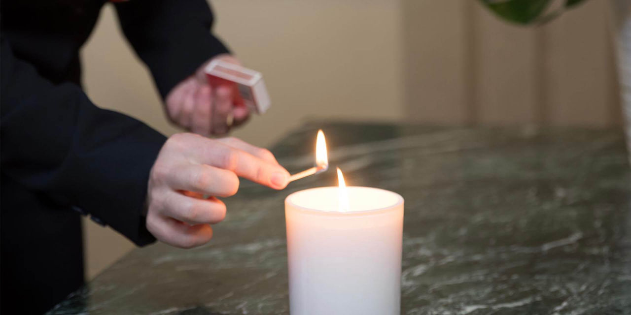 lighting up a candle